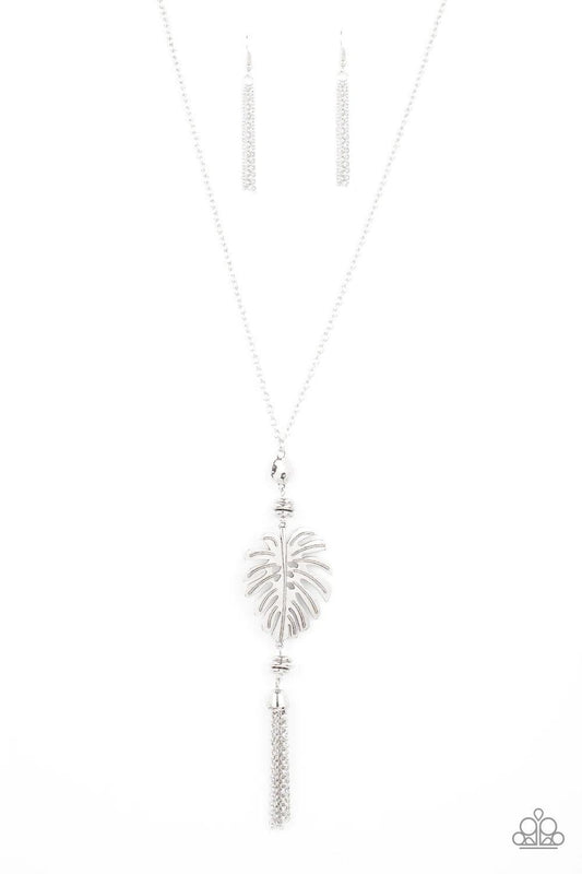 Paparazzi Accessories Palm Promenade - Silver Infused with silver beaded accents, a lifelike silver palm leaf frame attaches to the bottom of a shimmery silver chain. A silver chain tassel swings from the bottom, adding flirtatious movement to the summery