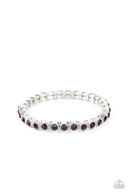 Paparazzi Accessories Starry Social - Purple Featuring shiny silver studded fittings, glittery purple rhinestones glide along stretchy bands around the wrist, creating a glamorous statement piece. Sold as one individual bracelet. Jewelry