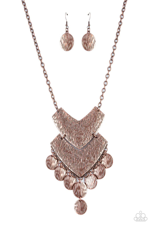 Paparazzi Accessories Keys to the ANIMAL Kingdom - Copper Etched in rustic copper textures, a pair oversized chevron-like copper frames delicately link into a wild statement piece. Matching textured copper discs swing from the bottom of the stacked displa