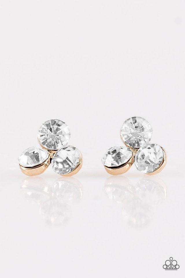 Paparazzi Accessories Everything Must GLOW! - Gold A trio of glowing white rhinestones coalesce into a timeless frame. Earring attaches to a standard post fitting. Jewelry