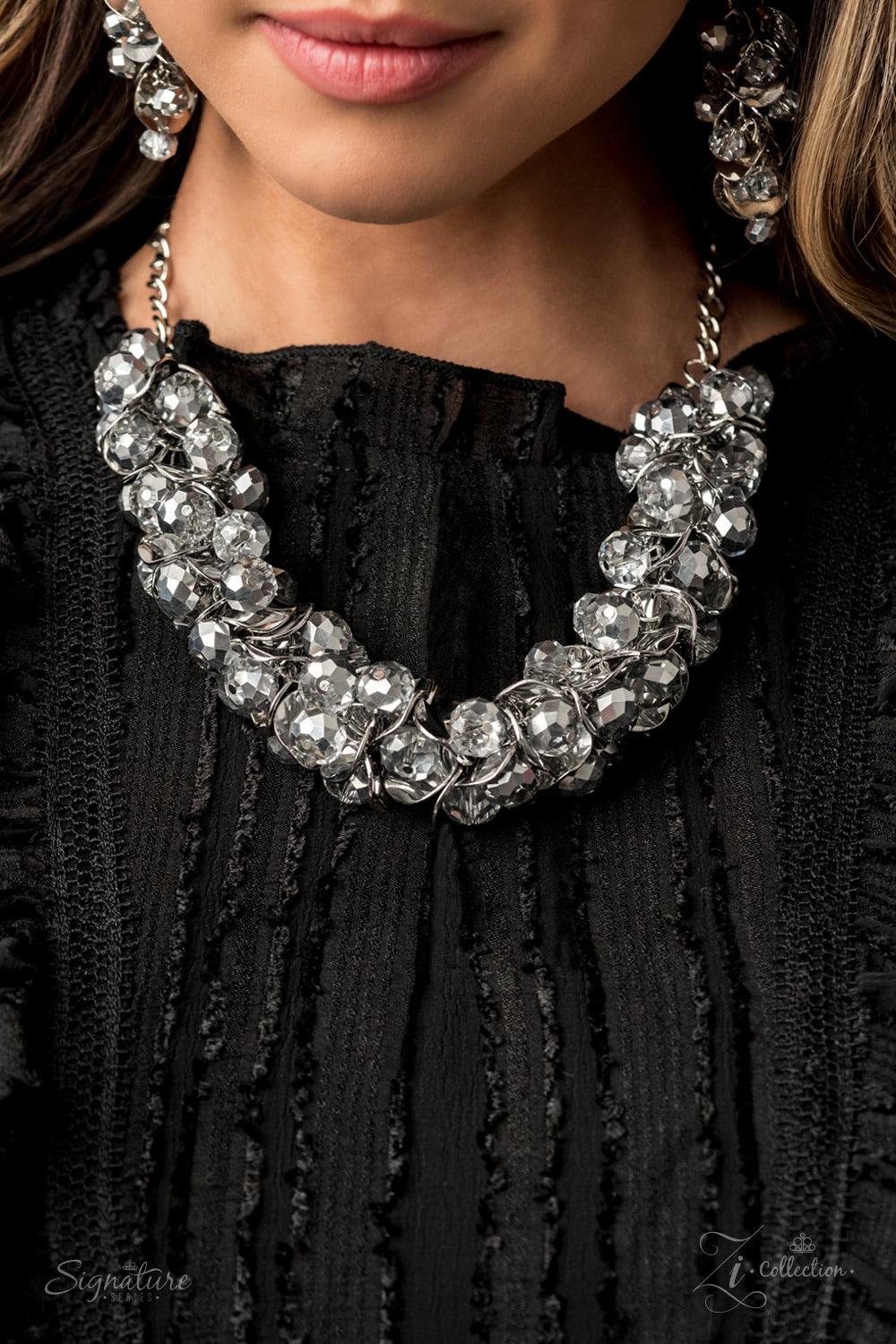 Paparazzi Accessories The Haydee 💗💗ZiCollection $25💗💗 A brazen collection of metallic dipped crystal-like beads and delicately bent silver discs boldly cluster into a fearless fringe below the collar. The exaggerated display of jam-packed sparkle take