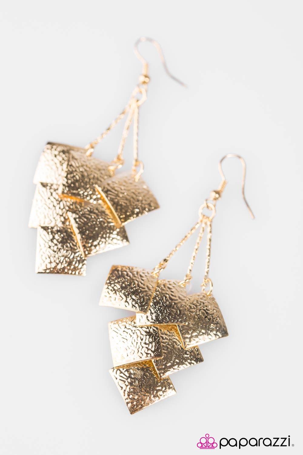Paparazzi Accessories Very Superstitious - Gold Hammered gold squares tilted into a sparkling diamond hang from three gold brass in an elegant industrial display. Brushed in an incandescent shimmer, the glistening gold squares fall into an enchanting lure