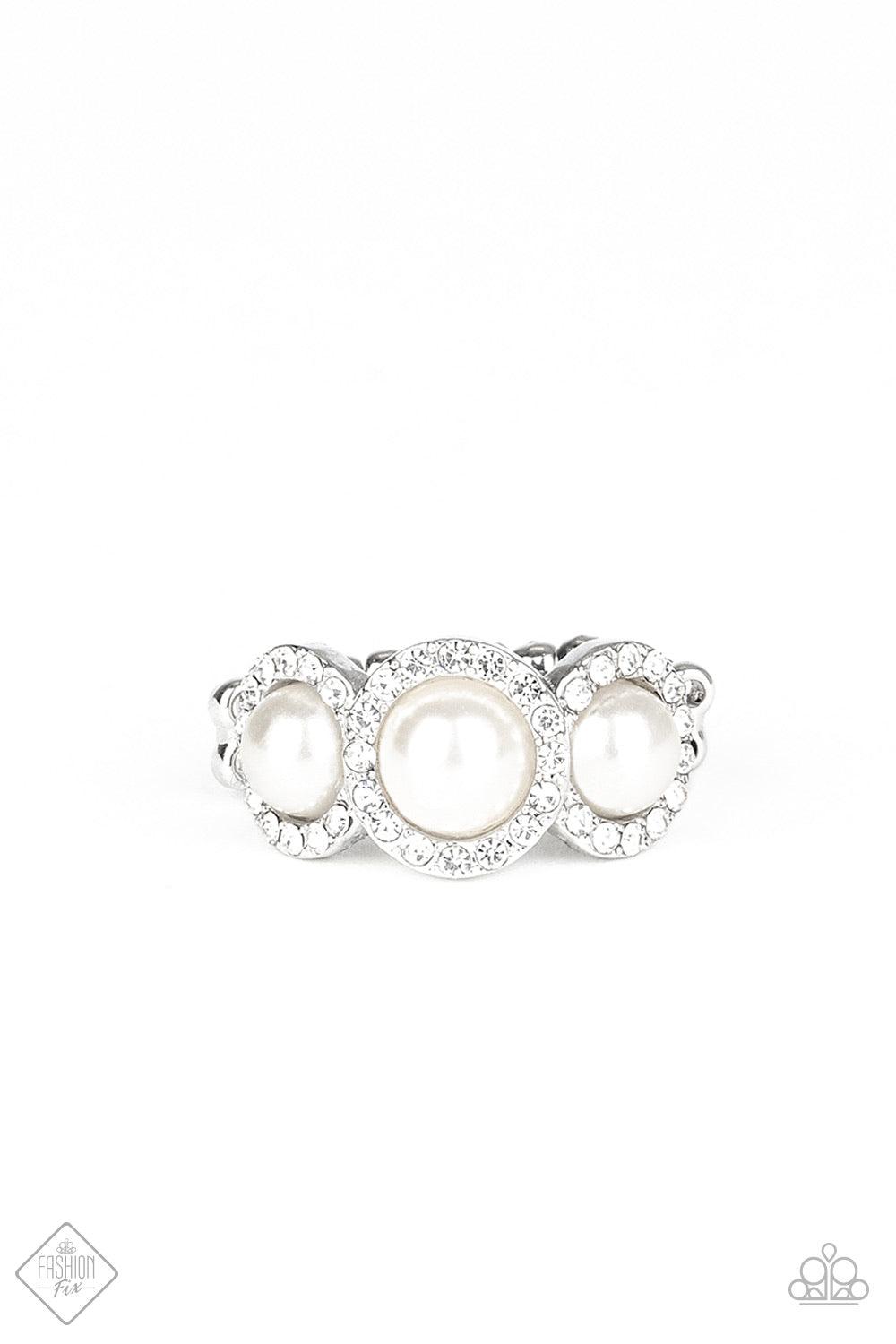 Paparazzi Accessories Shut The Front DIOR! - White Encrusted in rings of glassy white rhinestones, three dainty white pearls delicately adorn the front of a silver band for a timeless look. Features a dainty stretchy band for a flexible fit. Jewelry