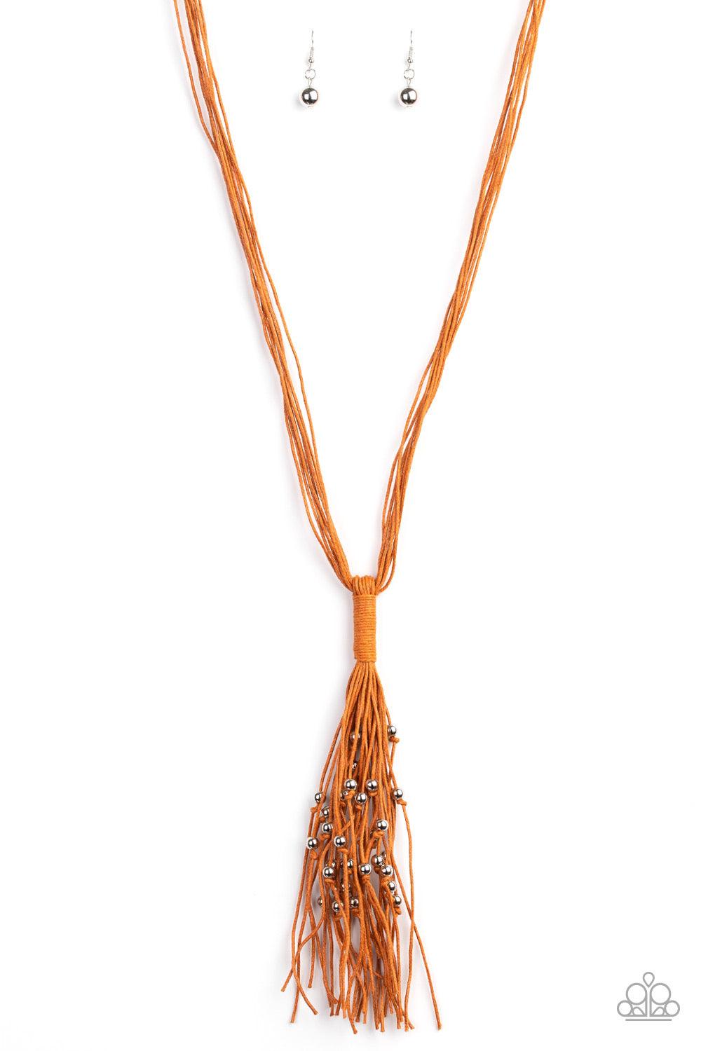 Paparazzi Accessories Hand-Knotted Knockout - Orange Shiny silver beads are knotted in place along strands of orange cording that have been knotted into an edgy tassel at the bottom of matching lengthened cording. Features an adjustable clasp closure. Sol