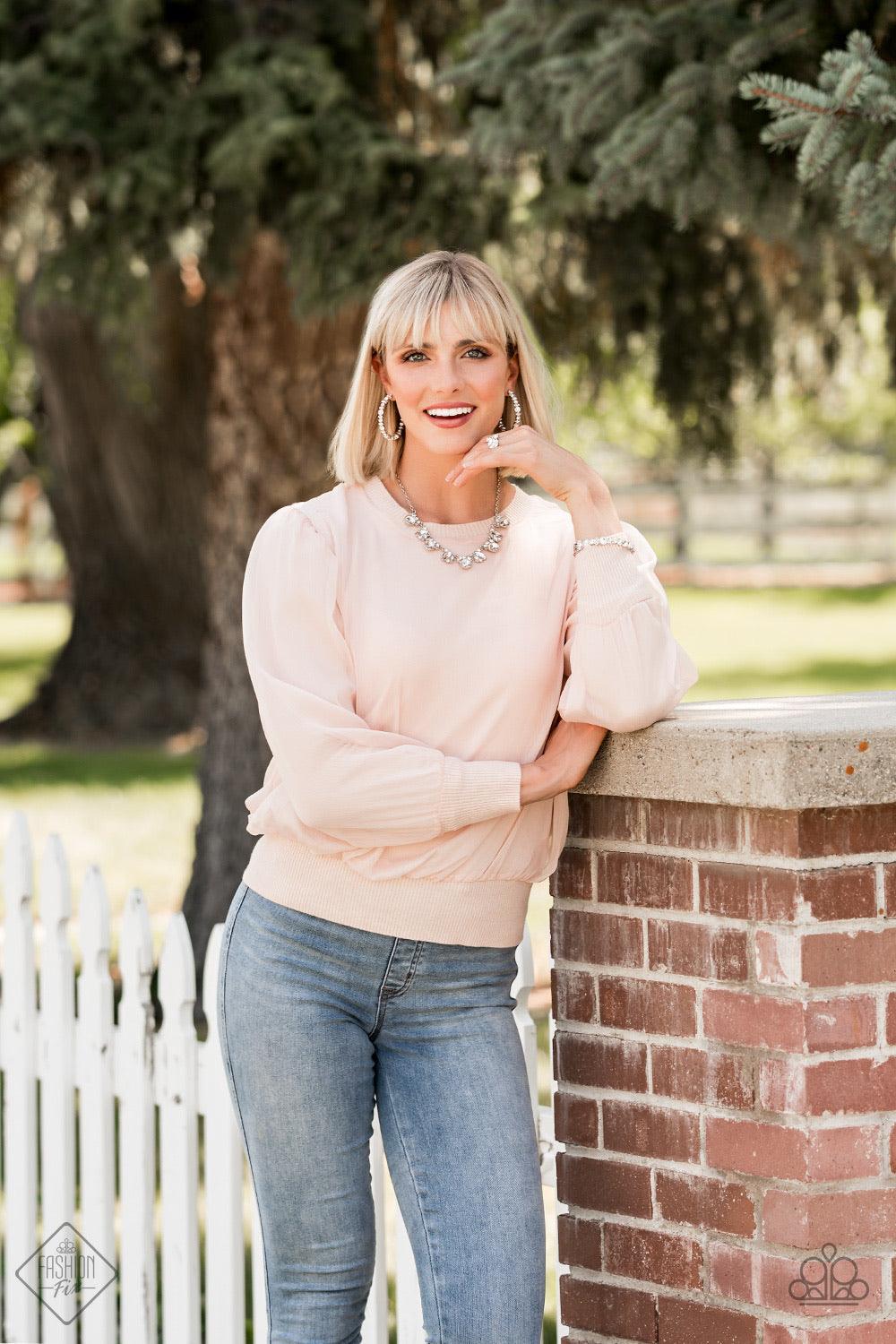 Paparazzi Accessories Can I Have Your Attention? - White A timeless collection of round and marquise-cut white rhinestones coalesce into a blinding silver hoop for a sassy, statement-making finish. Earring attaches to a standard post fitting. Hoop measure