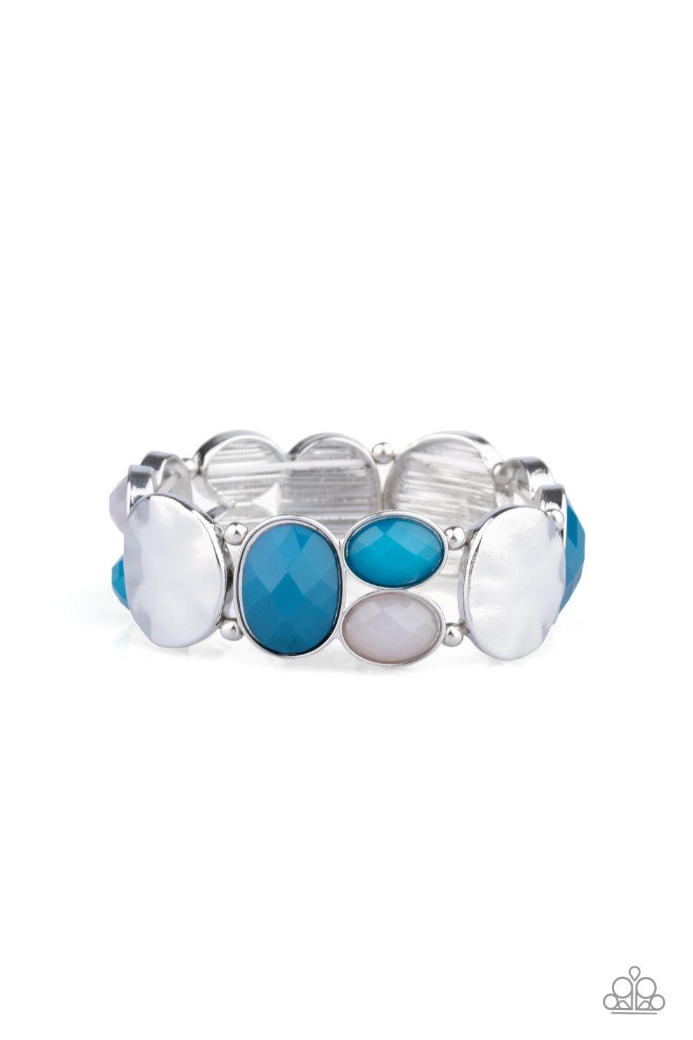 Paparazzi Accessories Chroma Charisma - Blue A mismatched collection of hammered silver pieces and faceted opaque and blue beads are threaded along a stretchy band around the wrist for a dramatically colorful look. Jewelry