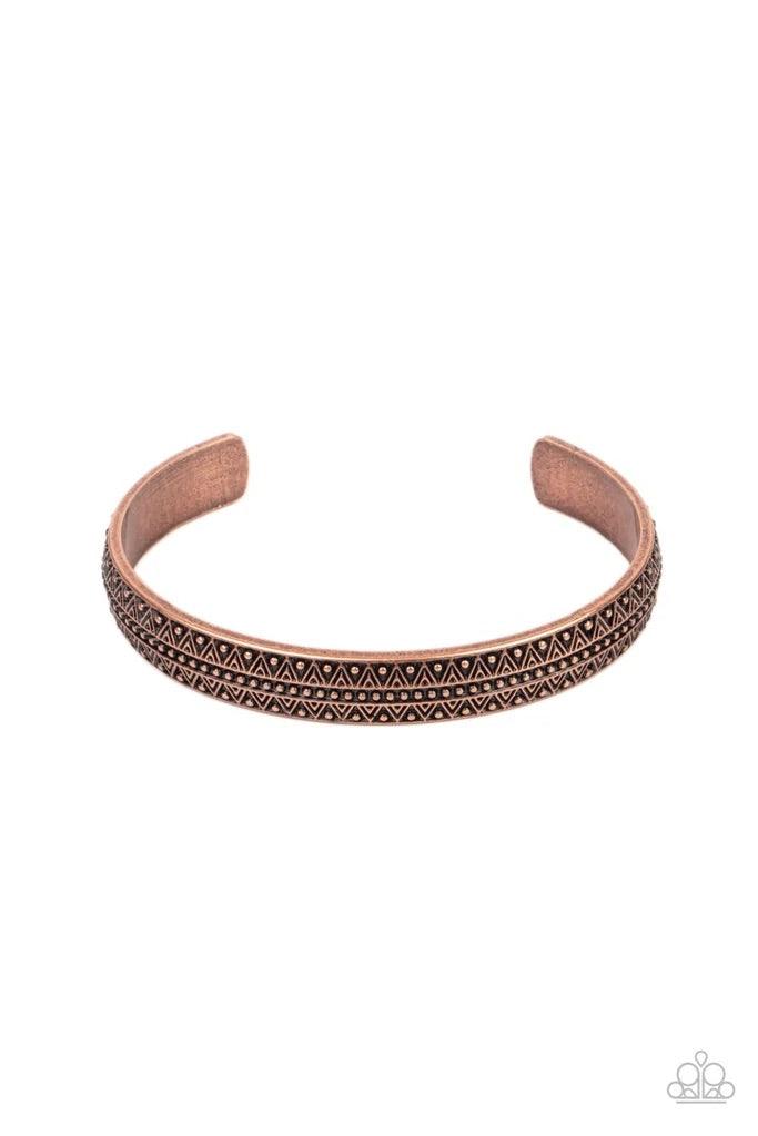 Paparazzi Accessories Peak Conditions - Copper Embossed and studded in geometric patterns, an antiqued copper cuff curls across the wrist for a dainty look. Sold as one individual bracelet. Jewelry