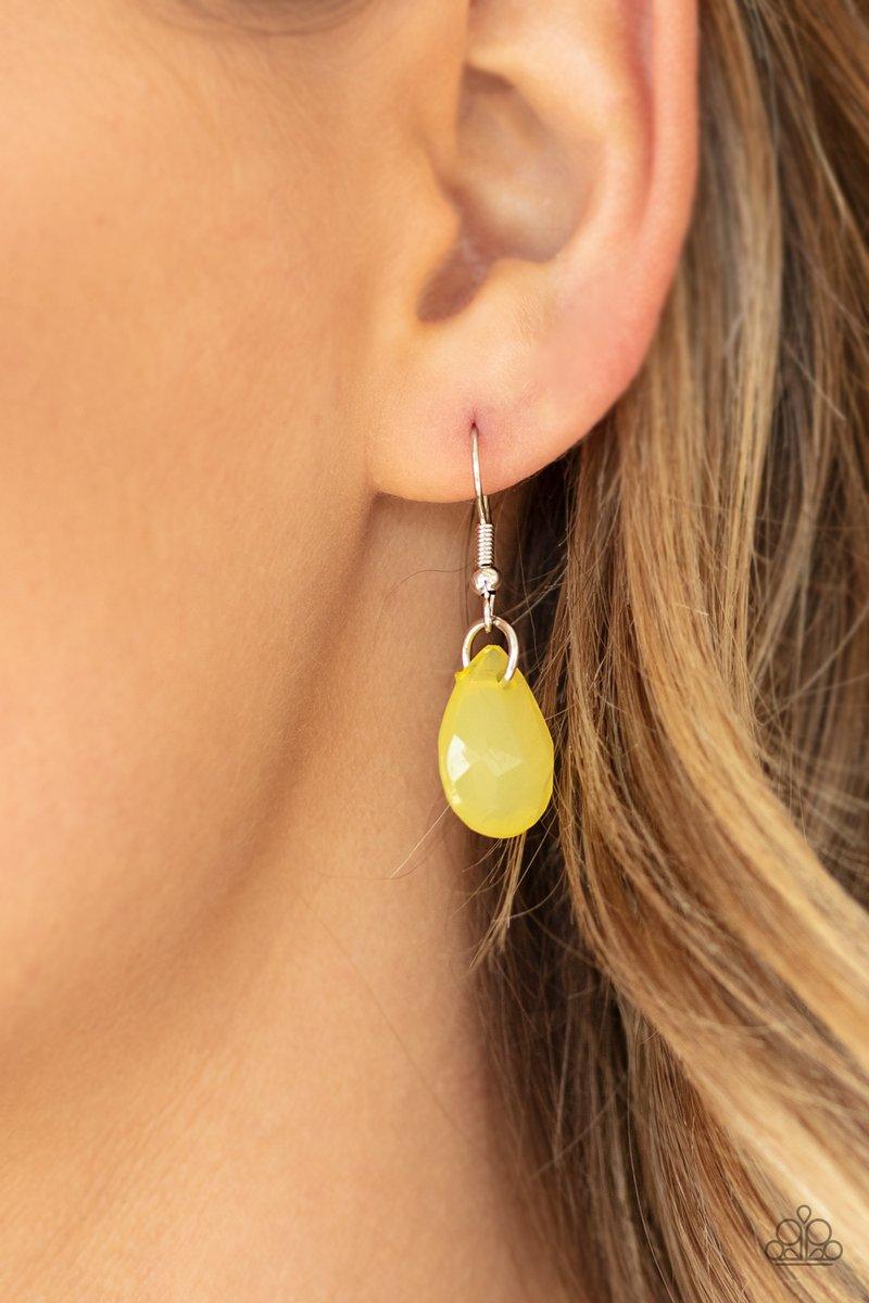 Paparazzi Accessories Rio Rainfall - Yellow Varying in size, opaque yellow teardrops drip from the bottom of a bowing silver bar, creating an effervescent fringe below the collar. Features an adjustable clasp closure. Sold as one individual necklace. Incl