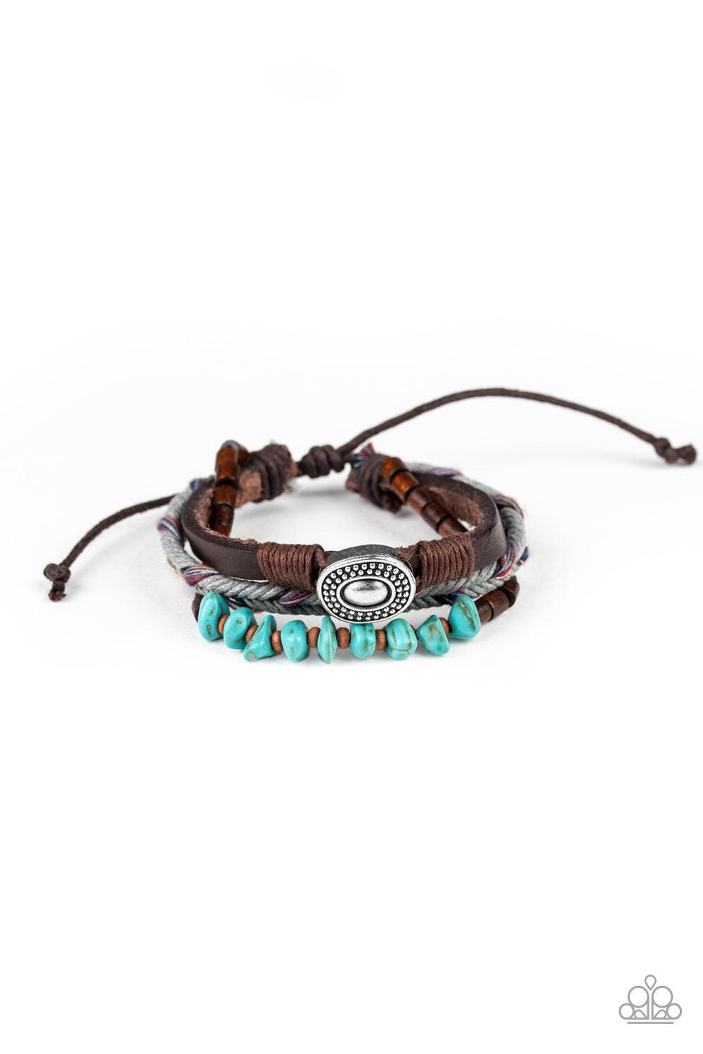 Paparazzi Accessories Find Your Path - Multi Colorfully braided cording, a thick leather band, and a strand of wooden beads and refreshing turquoise stones layer across the wrist for a seasonal look. Features an adjustable sliding knot closure. Sold as on