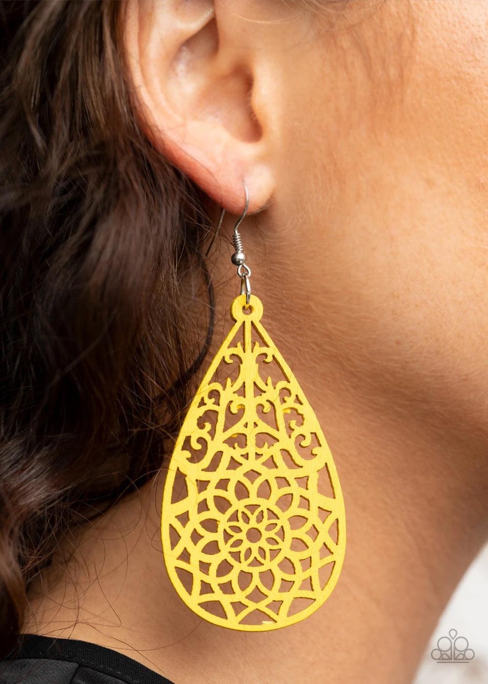 Paparazzi Accessories Seaside Sunsets - Yellow A sunny yellow wooden teardrop is cut into a stenciled floral pattern, creating a whimsical lure. Earring attaches to a standard fishhook fitting. Sold as one pair of earrings. Jewelry
