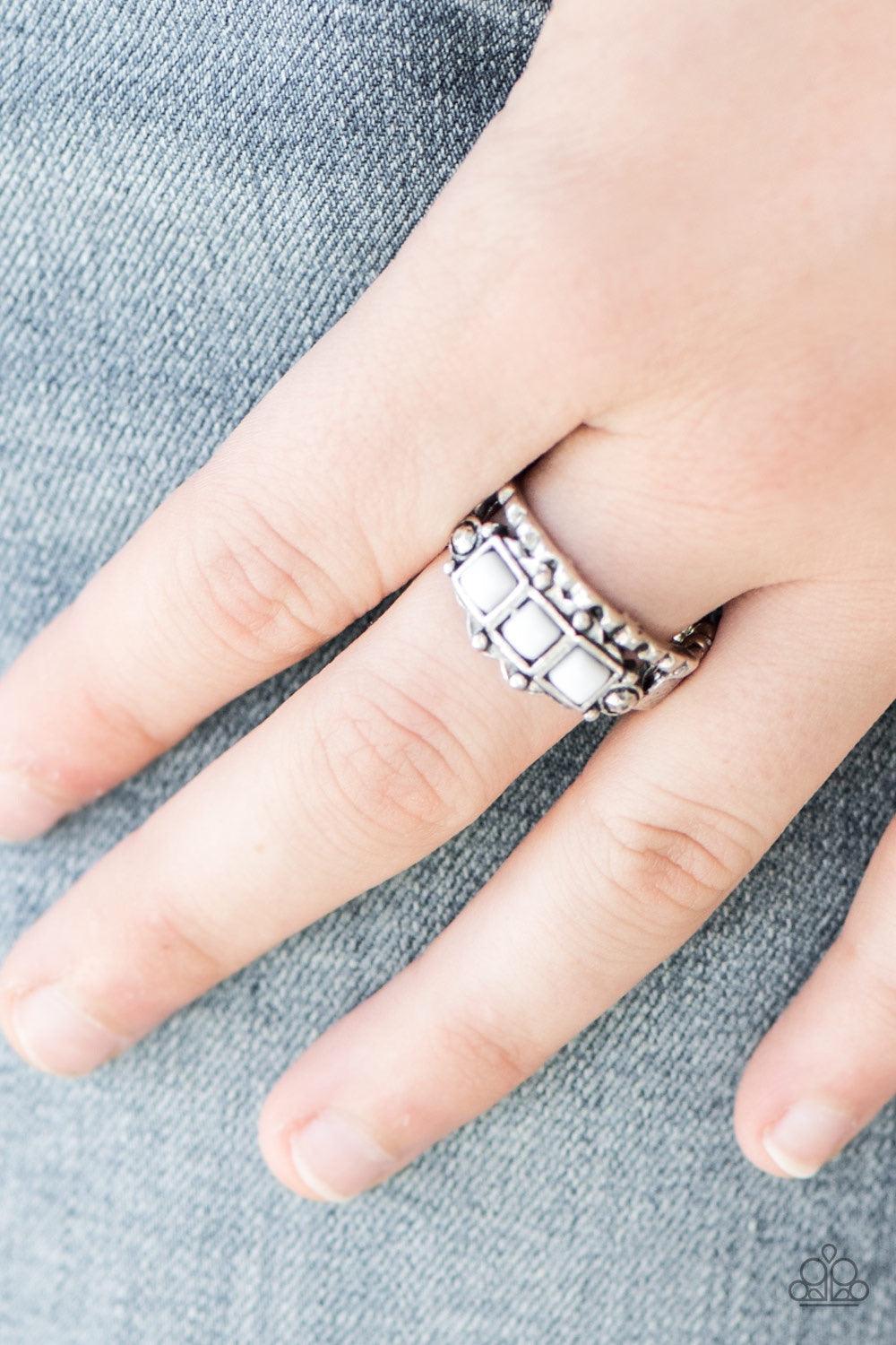 Paparazzi Accessories Color Me EMPRESSed! - White Featuring a square cut, white beads are pressed into a dainty silver band radiating with tribal inspired textures. Features a dainty stretchy band for a flexible fit. Jewelry