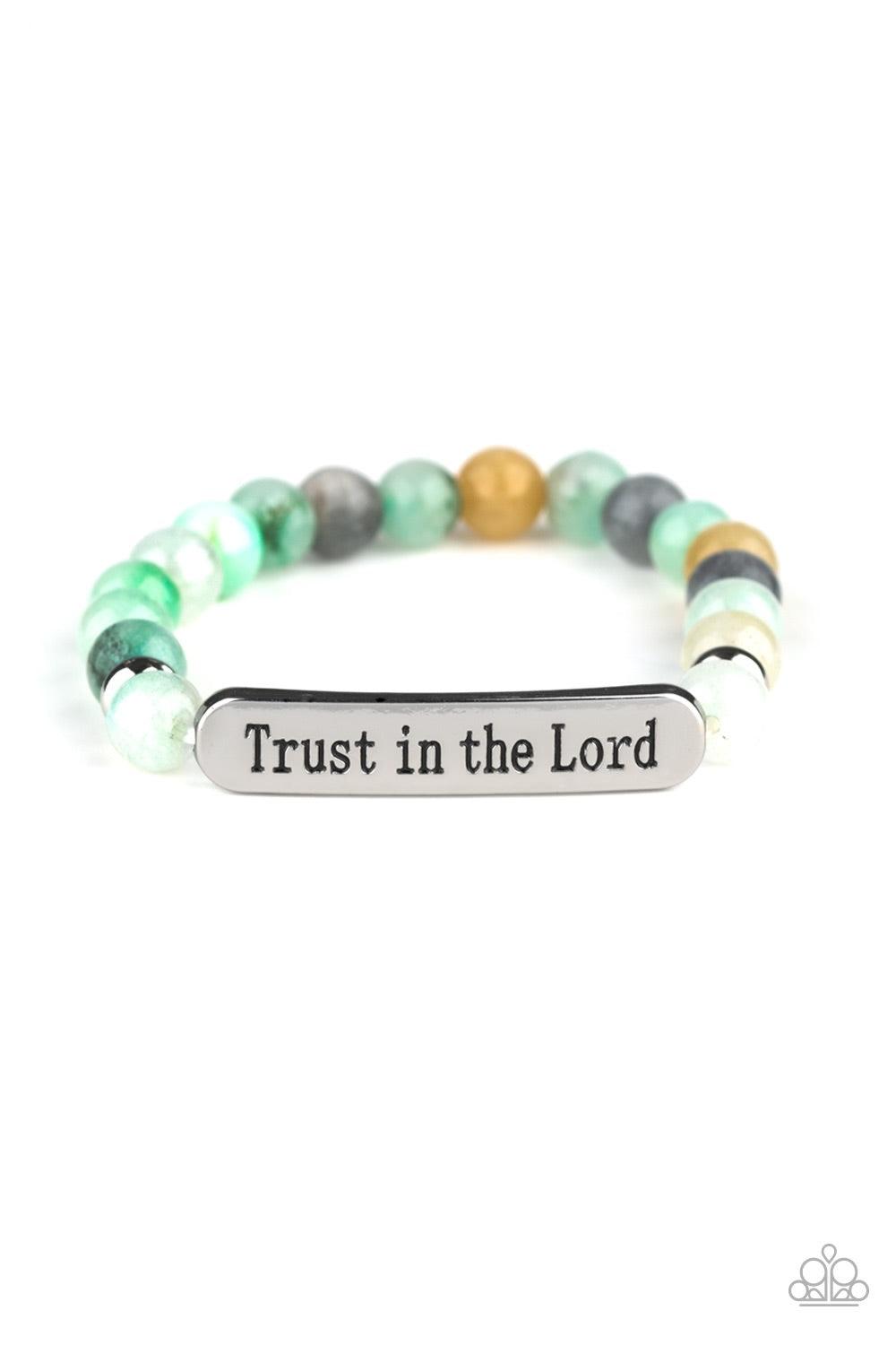 Paparazzi Accessories Trust Always - Green Infused with dainty silver accents, a collection of glassy stone beads and a shimmery silver frame stamped in the phrase, "Trust in the Lord", are threaded along a stretchy band around the wrist for an inspiratio
