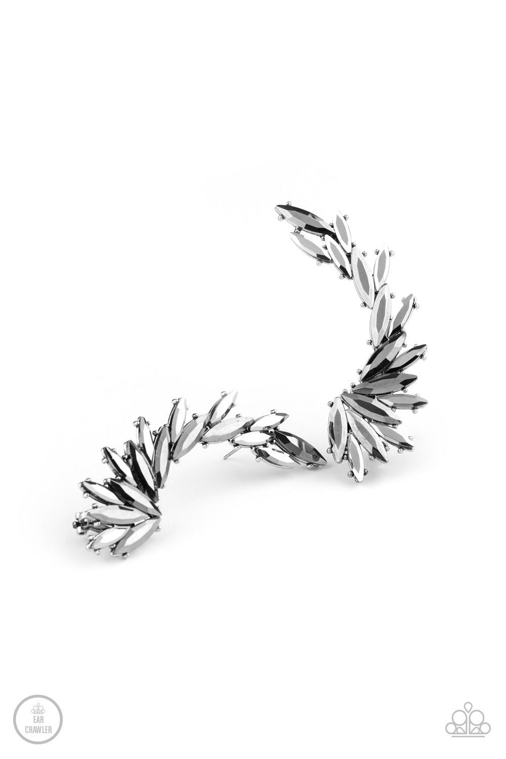 Paparazzi Accessories Because ICE Said So - Silver An explosion of marquise-cut hematite rhinestones delicately climb the ear, coalescing into a smoldering frame. Earring attaches to a standard post fitting. Features a clip-on fitting at the top for a sec