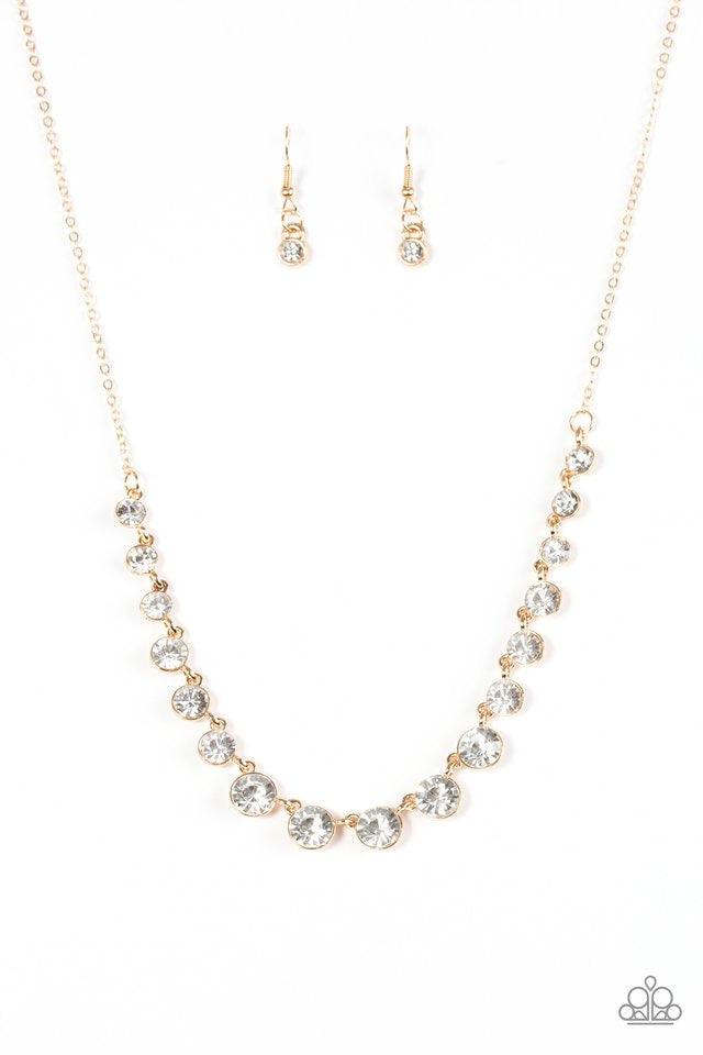 Paparazzi Accessories Here We GLOW! - Gold Gradually increasing in size towards the center, glittery white rhinestones link across the bottom of an elegantly elongated gold chain for a timeless look. Features an adjustable clasp closure. Jewelry