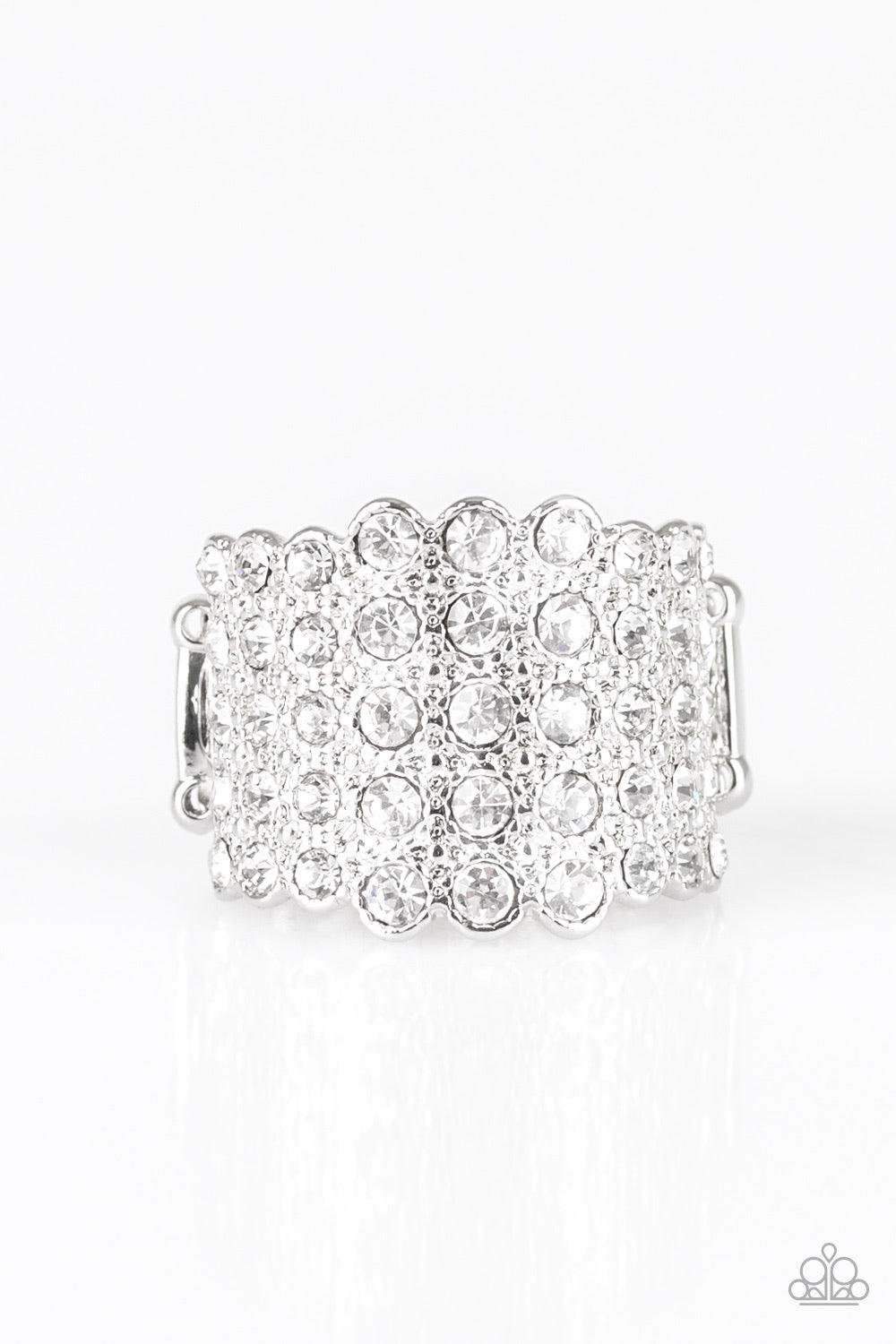 Paparazzi Accessories Million Dollar Masquerade ~White Row after row of blinding white rhinestones are stacked across a thick silver band for a dramatic look. Features a stretchy band for a flexible fit.