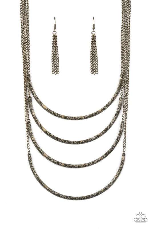 Paparazzi Accessories It Will Be Over MOON - Brass Embossed in ornate patterns, brass crescent frames layer down the chest for a statement-making look. Features an adjustable clasp closure. Sold as one individual necklace. Includes one pair of matching ea