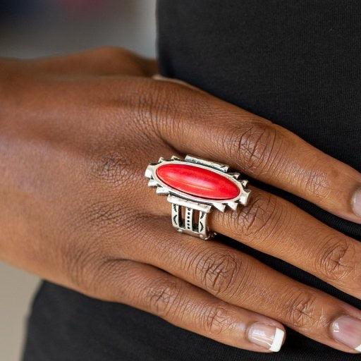 Paparazzi Accessories Canyon Colada ~Red An oblong red stone is pressed into the center of a geometric silver frame featuring a hammered finish for a seasonal flair. Features a stretchy band for a flexible fit. Sold as one individual ring.