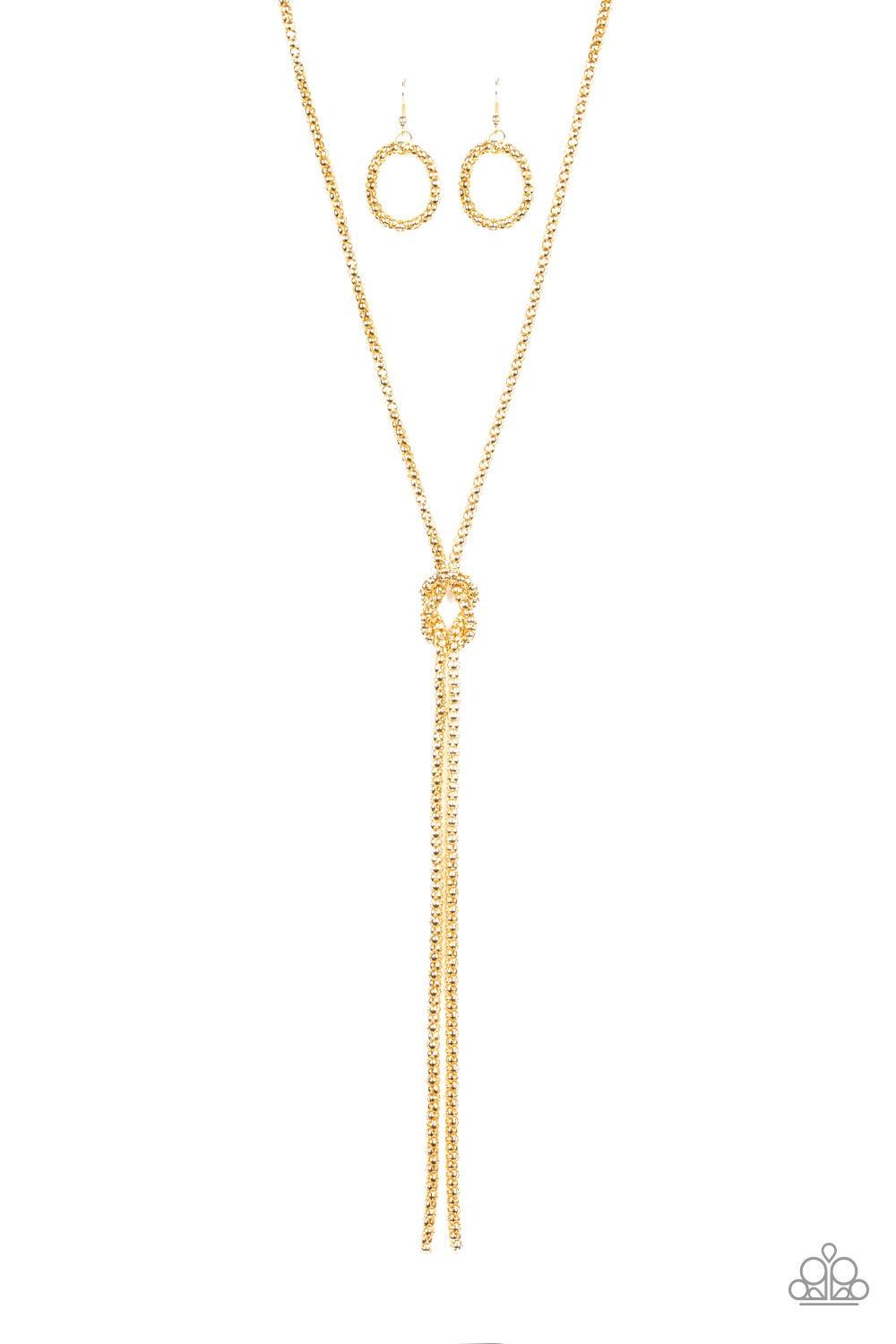 Paparazzi Accessories Born Ready - Gold A glistening strand of lengthened gold popcorn chain delicately knots at the chest, creating an edgy tasseled pendant. Features an adjustable clasp closure. Jewelry