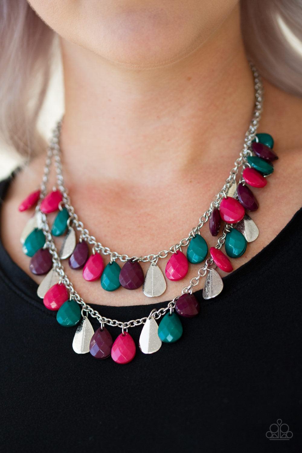 Paparazzi Accessories Life of the FIESTA - Multi Two strands of silver chain are decorated in a flirtatious fringe of faceted green, pink, and plum teardrops. Glittery beveled silver teardrops are sprinkled between the colorful beading, adding hints of sh