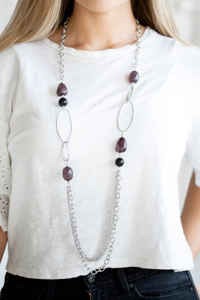 Paparazzi Accessories Pleasante Promenade - Black Featuring polished and cloudy faux rock finishes, black beads link with bold silver hoops. The whimsical compilation gives way to layers of mismatched silver chains for a seasonal finish. Features an adjus