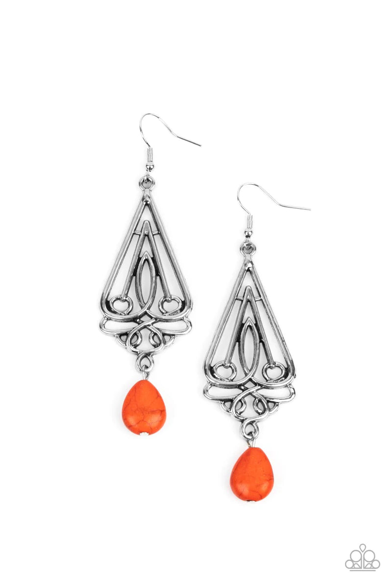 Paparazzi Accessories Transcendent Trendsetter - Orange A refreshing orange teardrop stone swings from the bottom of an ornate triangular frame, creating a seasonal statement. Earring attaches to a standard fishhook fitting. Sold as one pair of earrings.