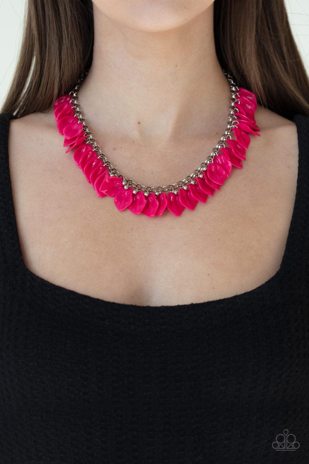 Paparazzi Accessories Super Bloom - Pink Painted in a flamboyant pink finish, curved acrylic petals cascade from the bottom of a shimmery silver chain, creating a flirtatious fringe below the collar. Features an adjustable clasp closure. Sold as one indiv