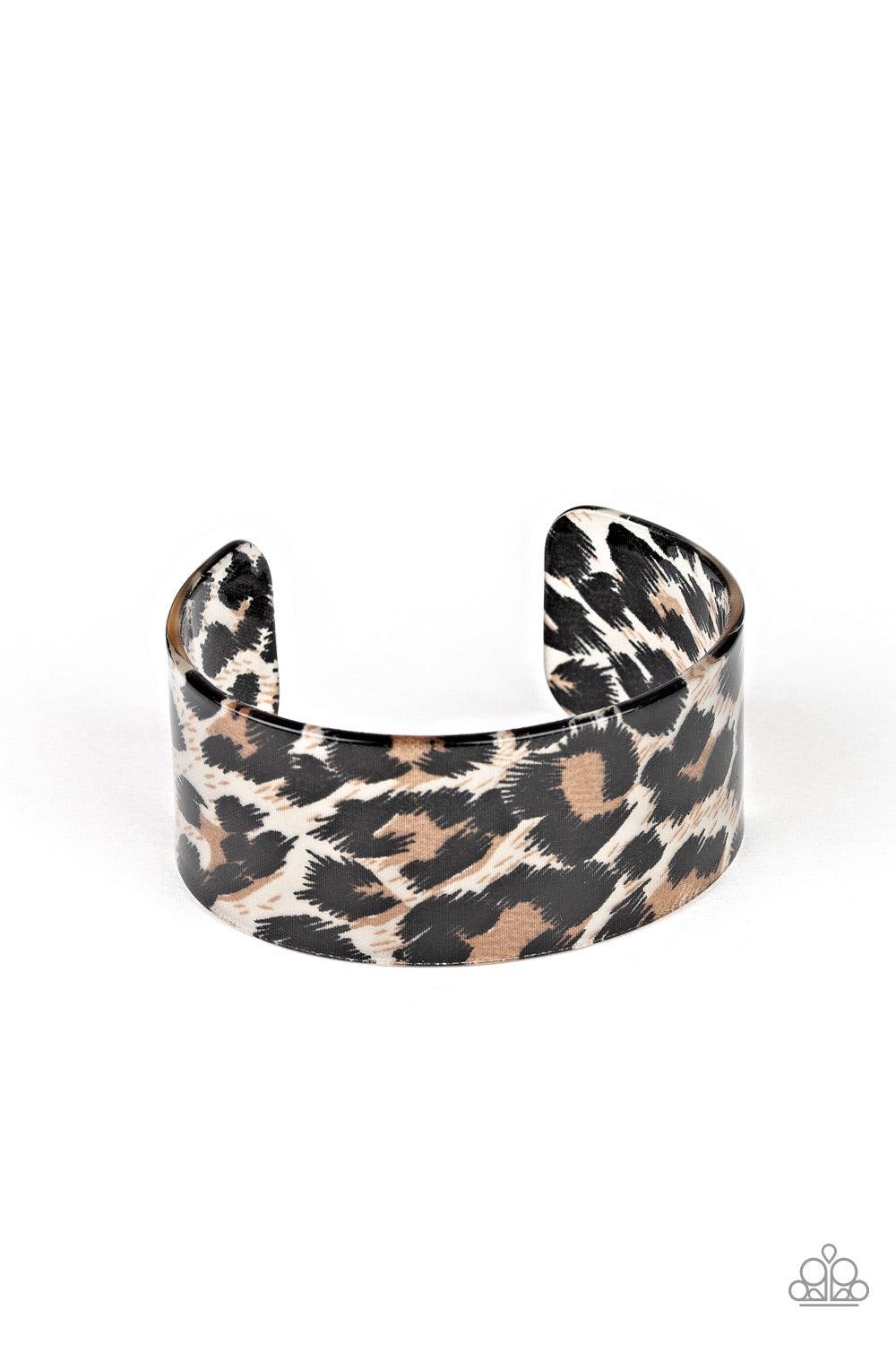 Paparazzi Accessories Top Cat - Brown Featuring a brown and black cheetah pattern, a thick acrylic cuff curls around the wrist for a wildly retro fashion. Jewelry