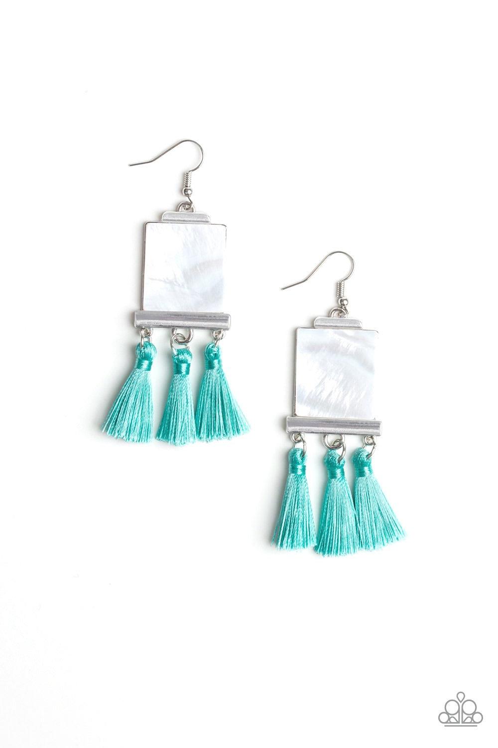 Paparazzi Accessories Tassel Retreat - Blue A rectangular shell-like accent is nestled into a shiny silver frame. A trio of shiny blue threaded tassels swing from the bottom of the incandescent frame for a flirtatious finish. Earring attaches to a standar
