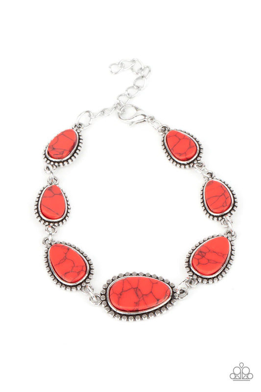 Paparazzi Accessories Elemental Exploration- Red Encased in frames of flattened silver studs, pieces of flat red stone teardrops gradually increase in size as they link around the wrist for an artisan inspired look. Features an adjustable clasp closure. S