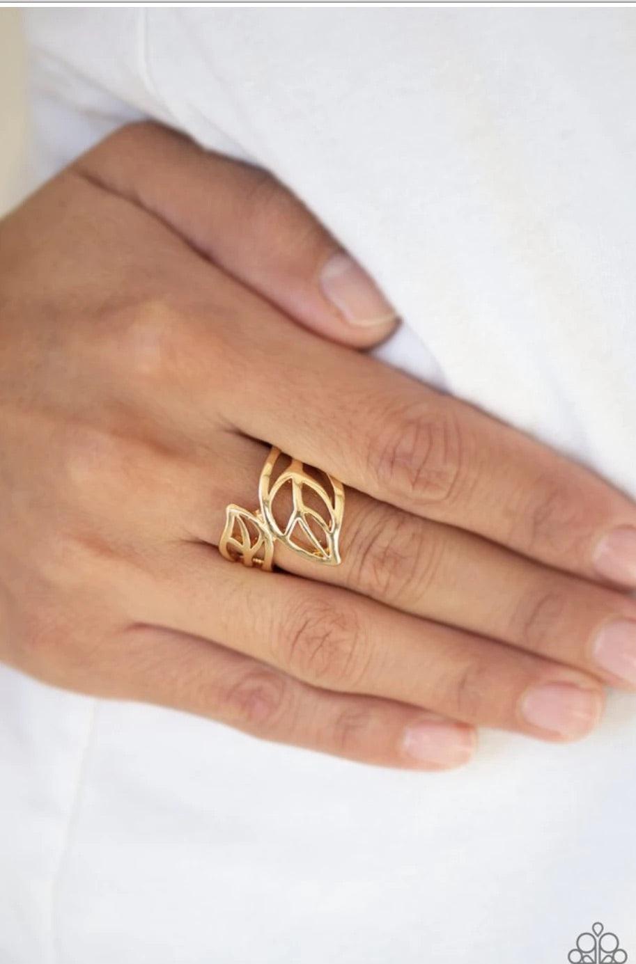 Paparazzi Accessories Leaf It All Behind - Gold Brushed in a high-sheen finish, leafy gold bands curl around the finger in a seasonal fashion. Features a dainty stretchy band for a flexible fit. Sold as one individual ring. Jewelry