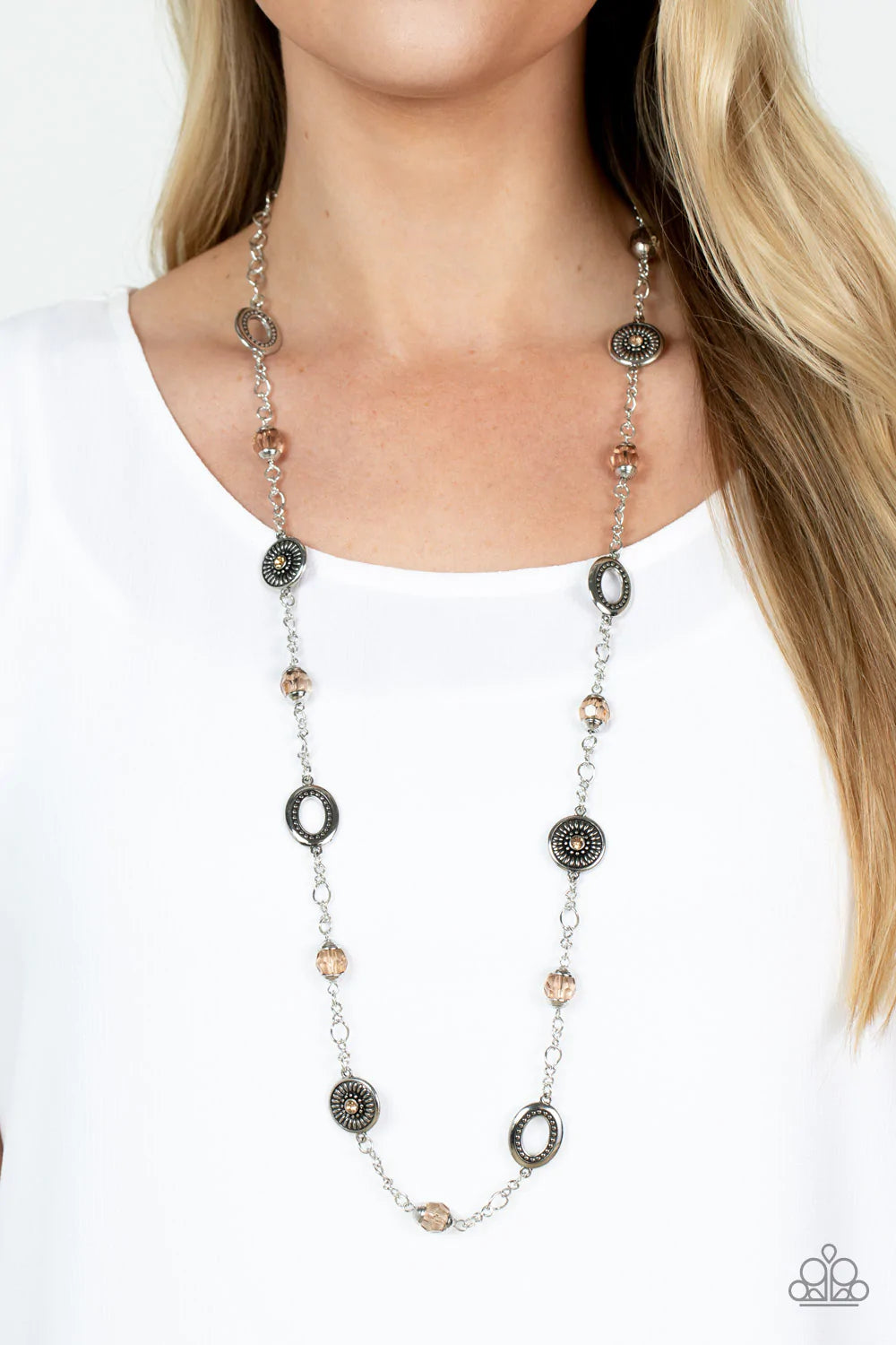 Paparazzi Accessories Glammed Up Goals - Brown Faceted smoky topaz beads capped in silver accents and antiqued silver medallions dotted with smoky topaz rhinestone centers and radiating texture alternate with sections of silver chain creating a charismati