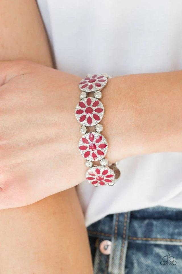 Paparazzi Accessories Dancing Dahlia - Red Painted in a rich red finish, ornate silver floral frames are threaded along a stretchy band across the wrist for a seasonal look. Sold as one individual bracelet Jewelry