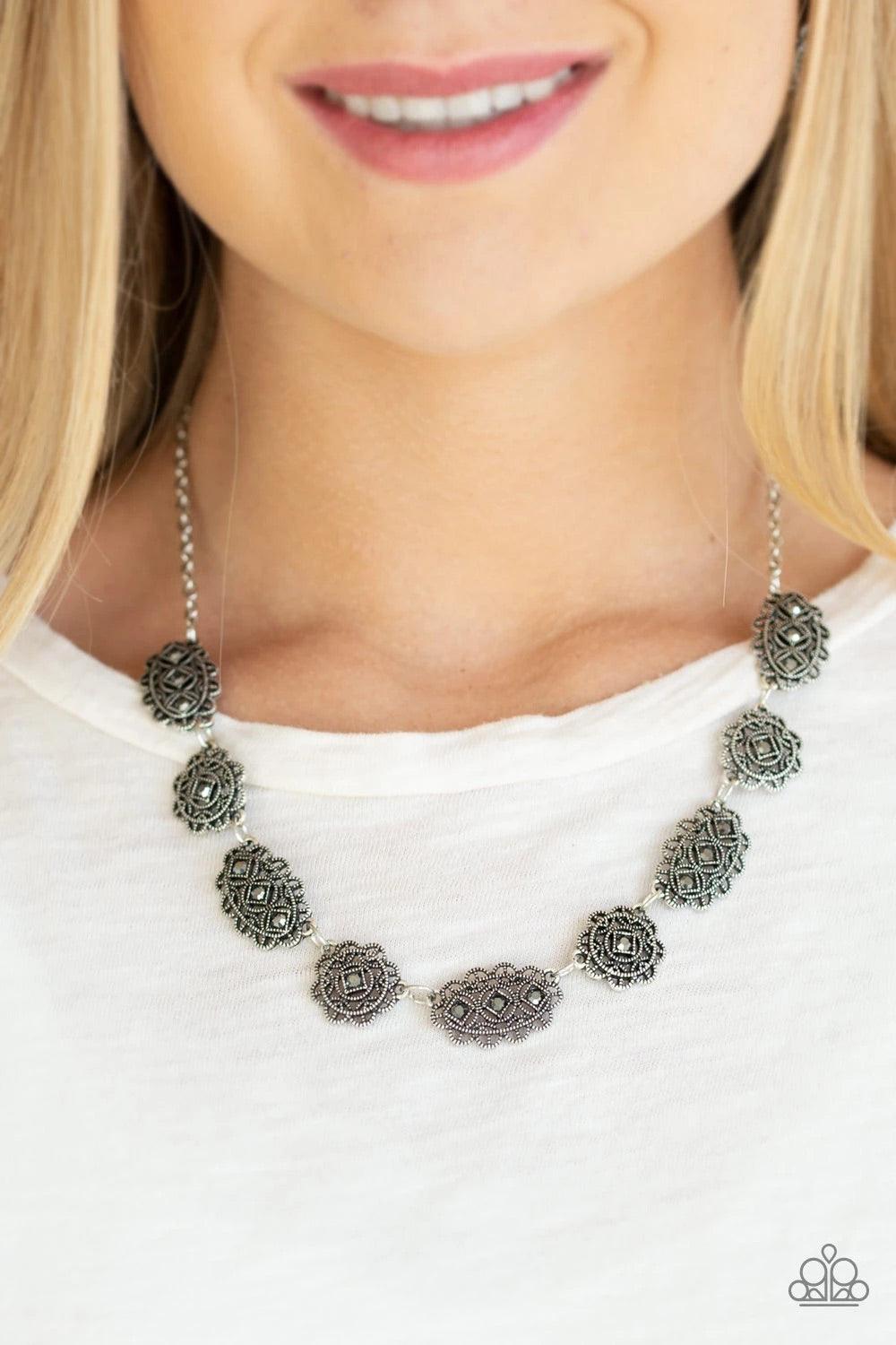 Paparazzi Accessories Vintage Vogue- ~Silver Encrusted in glittery hematite rhinestones, ornate filigree filled silver frames link below the collar for a vintage inspired style. Features an adjustable clasp closure. Jewelry