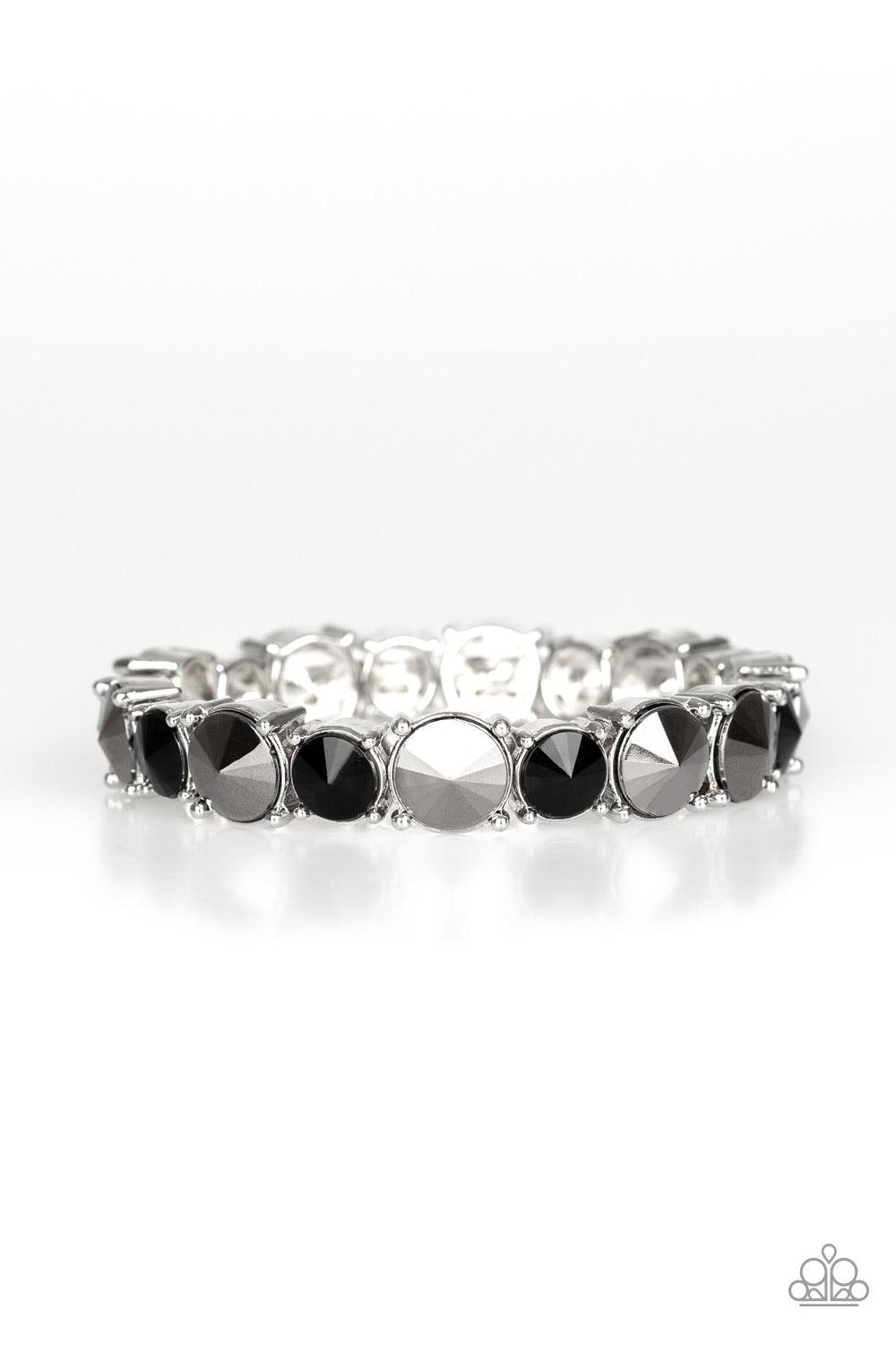 Paparazzi Accessories Born To Bedazzle - Multi An assortment of oversized black and hematite rhinestones are pressed into sleek square frames and threaded along stretchy bands, creating a blinding sparkle around the wrist. Jewelry