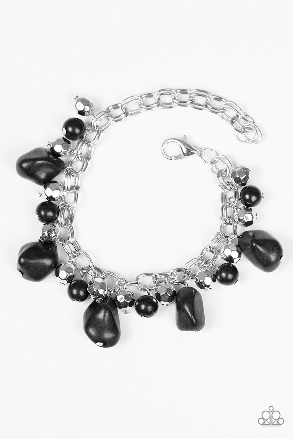 Paparazzi Accessories Practical Paleo - Black Featuring round and asymmetrical cuts, refreshing black stones trickle from the bottom of a double chain-linked chain. Faceted silver beads trickle between the stones, adding a splash of metallic shimmer to th