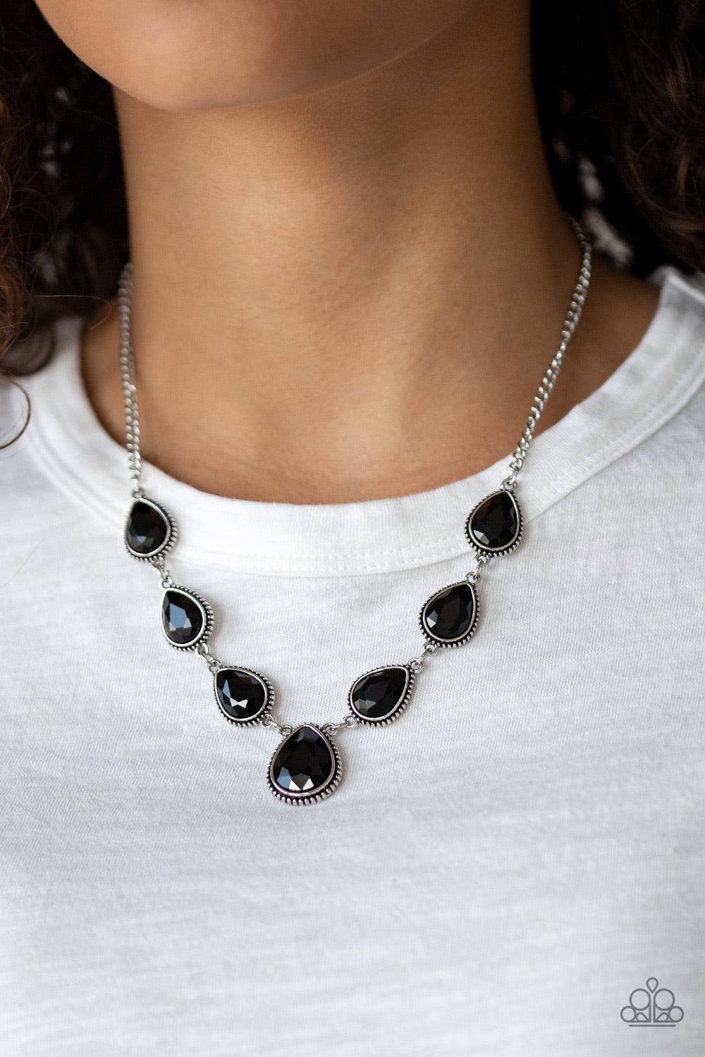 Paparazzi Accessories Socialite Social - Black Featuring ornate silver frames, glassy black teardrop gems link below the collar in a timeless fashion. The largest teardrop swings from the center, creating a glamorous pendant. Features an adjustable clasp