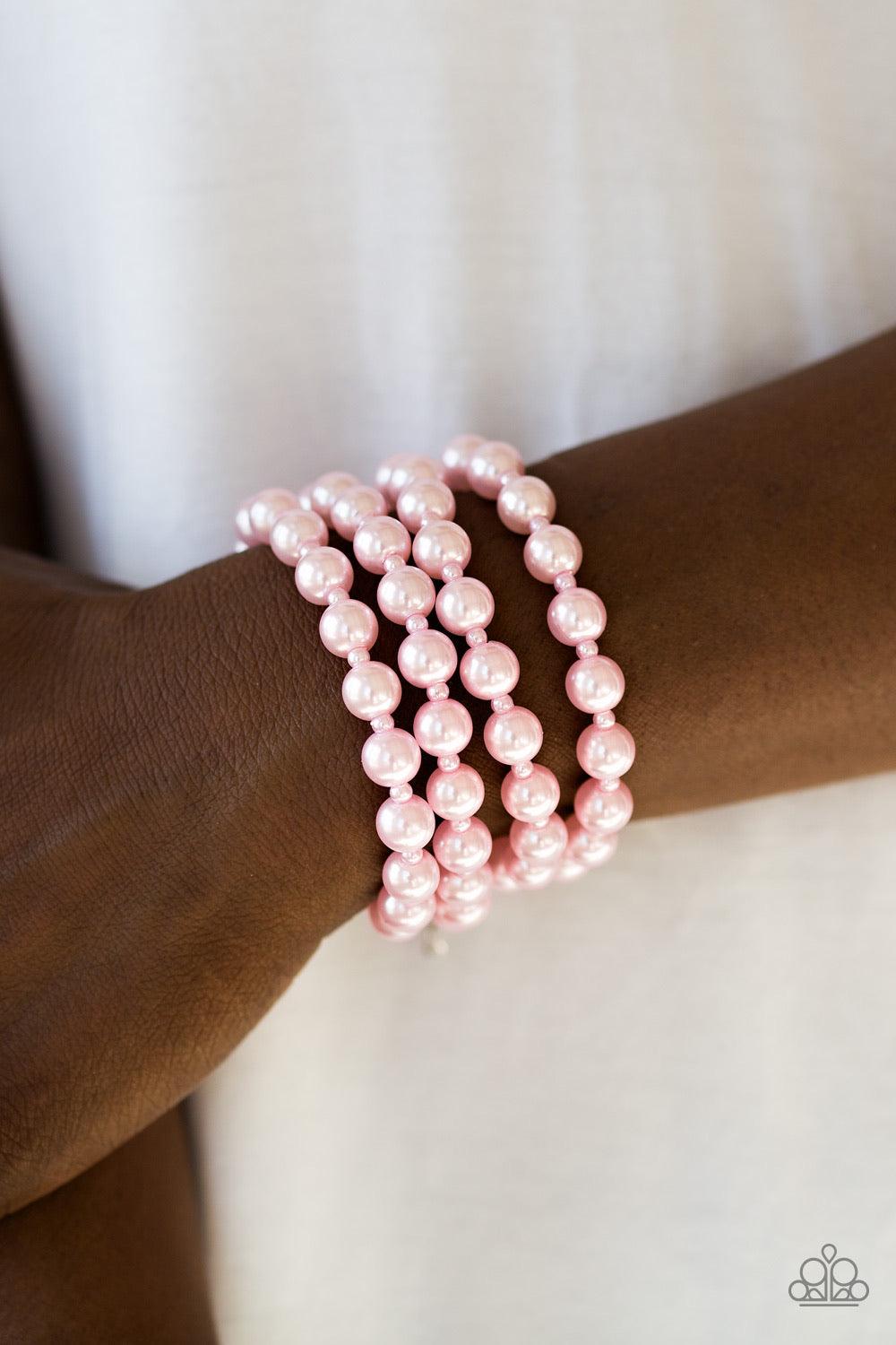 Paparazzi Accessories Work The BALLROOM ~Pink Rows of dainty and classic pink pearls are strung across the wrist for a timeless look. Features an adjustable clasp closure. Sold as one individual bracelet.