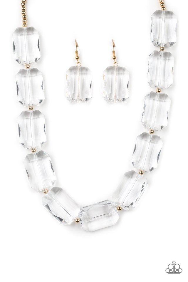 Paparazzi Accessories The ICE President - Gold Infused with dainty gold beads, glassy emerald-cut beads join below the collar for a dramatic look. Features an adjustable clasp closure. Sold as one individual necklace. Includes one pair of matching earring