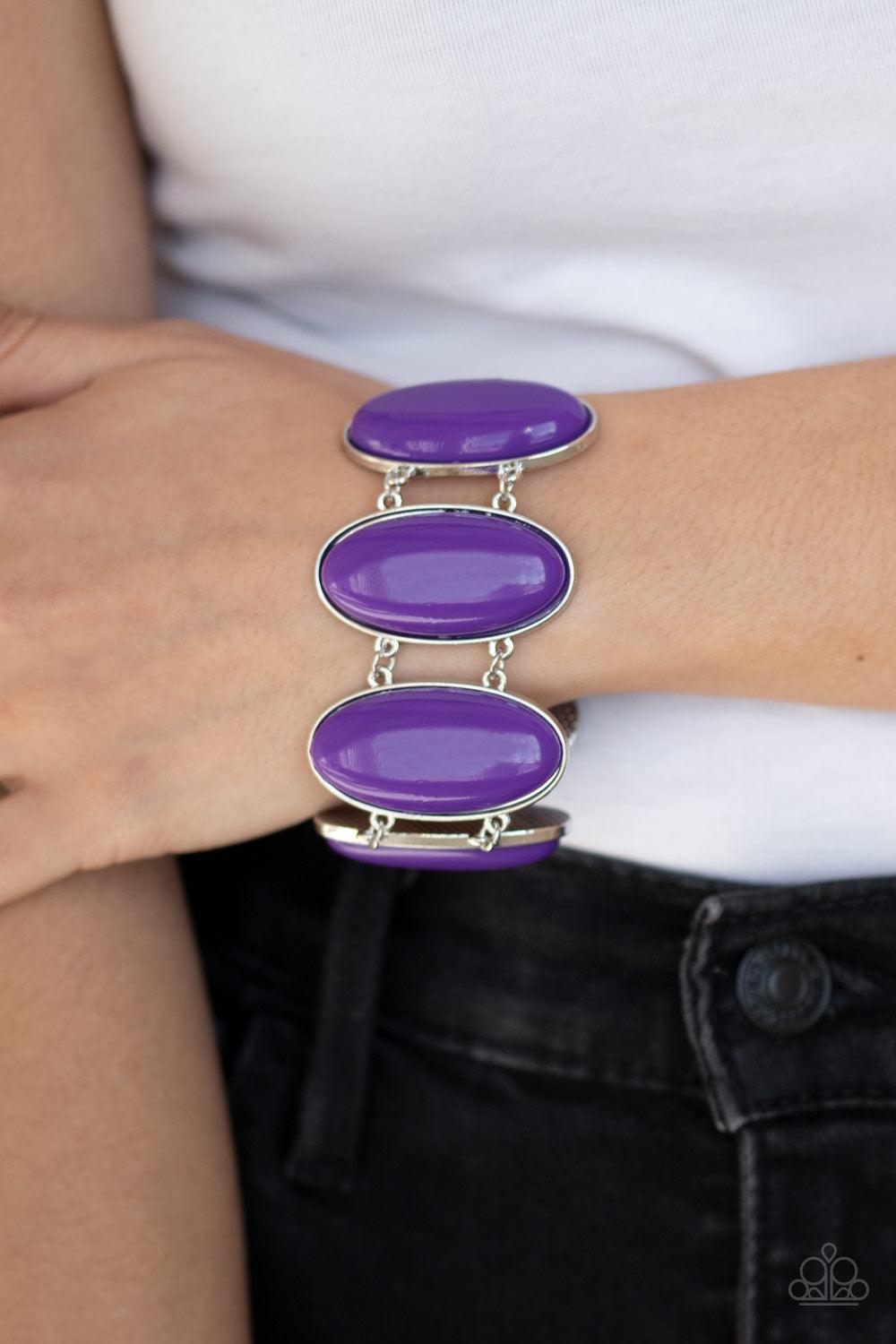 Paparazzi Accessories Power Pop - Purple Dotted with oblong purple beaded centers, vibrant silver frames link around the wrist for a powerful pop of color. Features an adjustable clasp closure. Jewelry