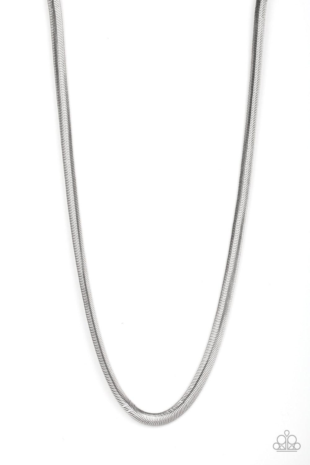 Paparazzi Accessories Kingpin - Silver Featuring a high-sheen finish, a thick silver herringbone chain drapes across the chest for a sleek, upscale look. Features an adjustable clasp closure. Sold as one individual necklace. Jewelry