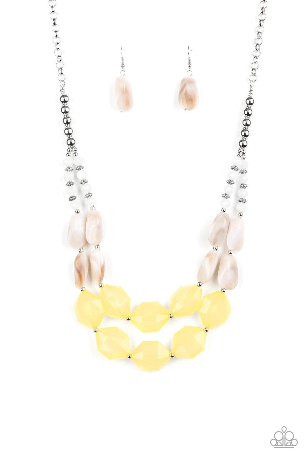 Paparazzi Accessories Seacoast Sunset - Yellow A whimsical collection of silver, opaque crystal-like, cloudy white, and faceted yellow beads are threaded along invisible wires, creating statement-making layers below the collar. Features an adjustable clas