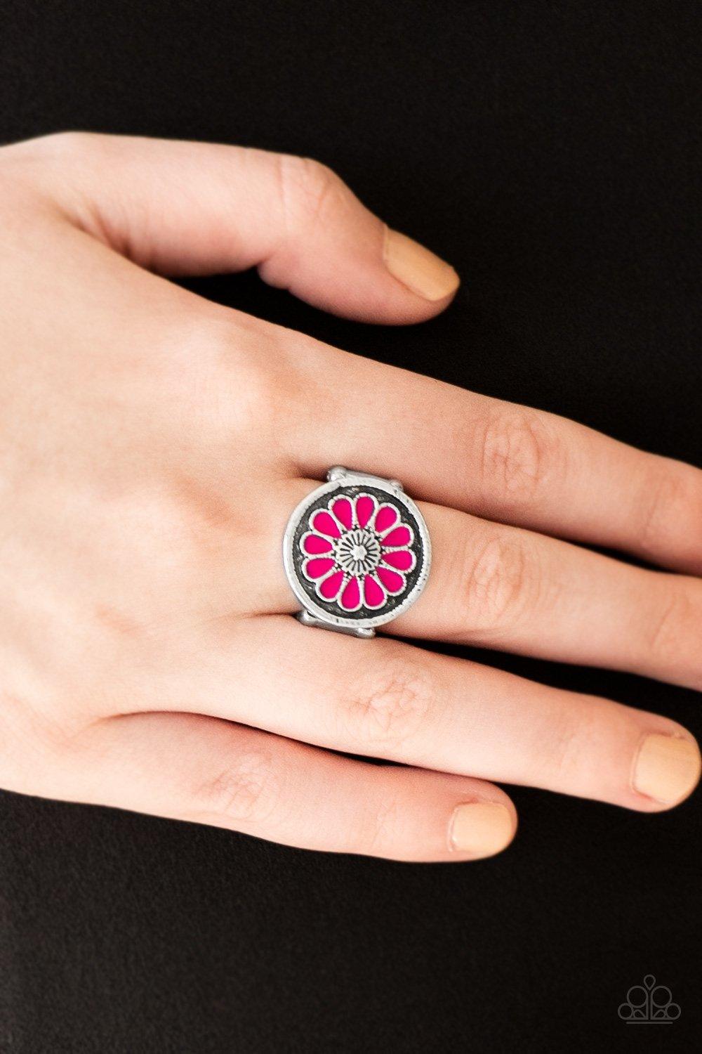 Paparazzi Accessories Garden View - Pink Brushed in an antiqued shimmer, vivacious pink petals spin into a whimsical floral pattern atop the finger. Features a stretchy band for a flexible fit. Sold as one individual ring. Jewelry