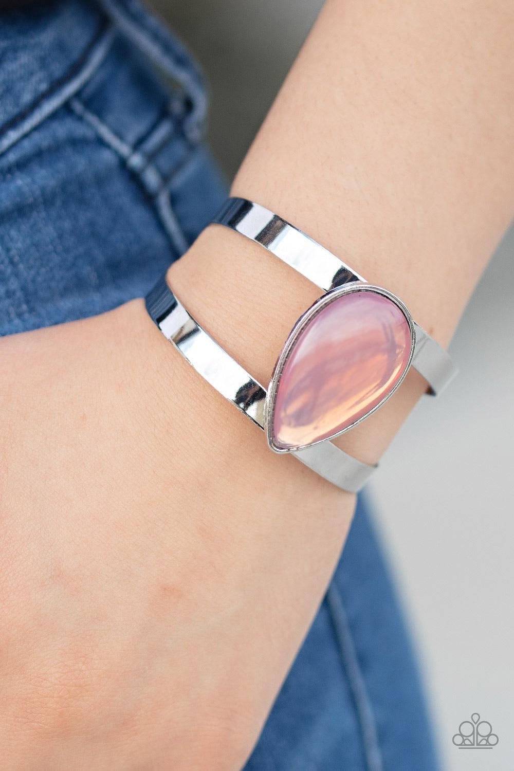 Paparazzi Accessories Optimal Opalescence - Pink Featuring a sleek silver frame, an opalescent pink teardrop bead sits atop an airy silver cuff in an ethereal fashion. Sold as one individual bracelet. Jewelry
