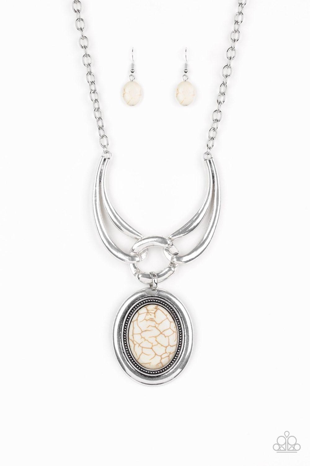 Paparazzi Accessories Divide And RULER - White Three handcrafted silver pieces connect below the collar in a bold artisan inspired fashion. Nestled in the center of a studded silver frame, an oversized white stone pendant swings from the bottom of the int