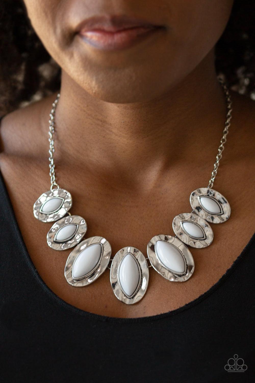 Paparazzi Accessories Terra Color - White Dotted with shiny white beads, a collection of hammered geometric frames gradually increase in size as they fan out below the collar for a boldly colorful look. Features an adjustable clasp closure. Sold as one in