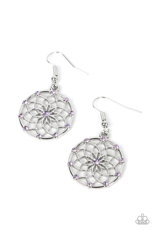 Paparazzi Accessories Springtime Salutations - Purple Dotted with dainty purple rhinestones, an airy mandala-like blossom blooms inside a silver hoop for a seasonal shimmer. Earring attaches to a standard fishhook fitting. Sold as one pair of earrings. Je