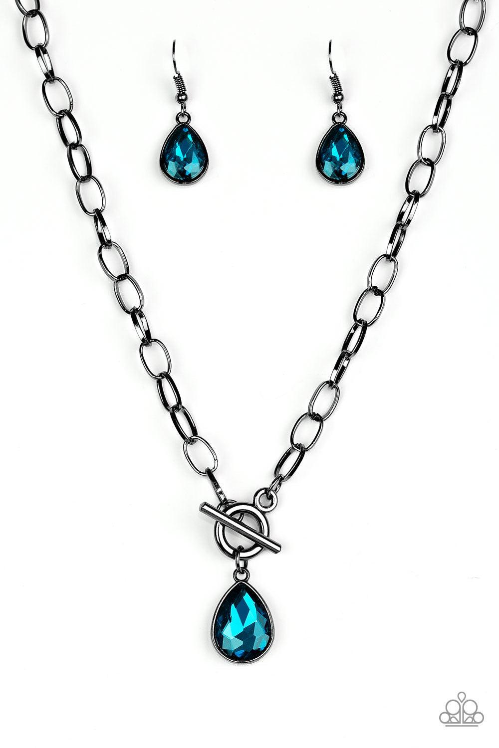 Paparazzi Accessories So Sorority - Blue A faceted blue teardrop gem swings from the bottom of a glistening gunmetal chain, creating a classic pendant below the collar. Features a toggle closure. Sold as one individual necklace. Includes one pair of match