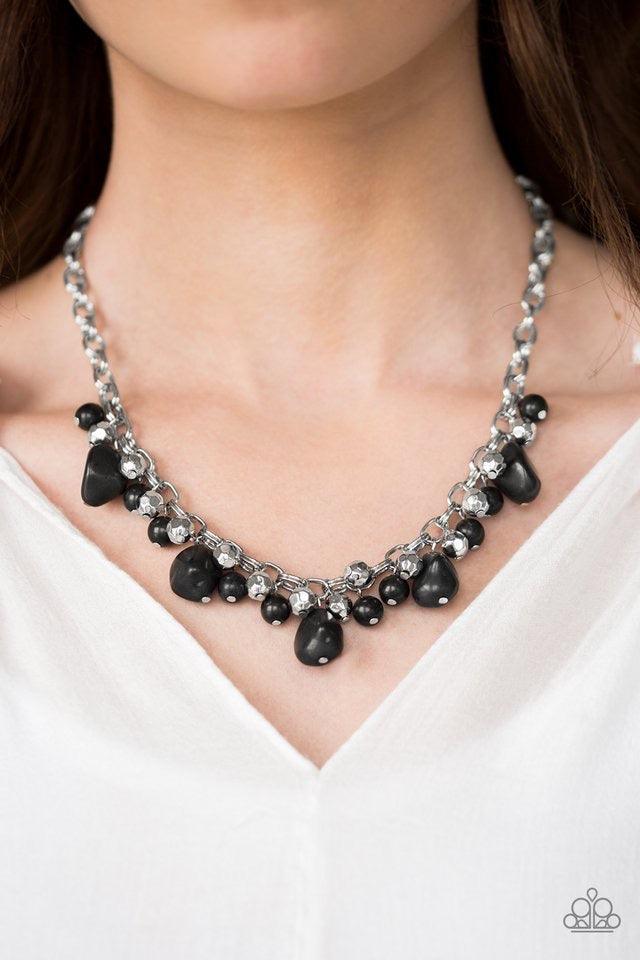 Paparazzi Accessories Paleo Princess - Black Featuring round and asymmetrical cuts, refreshing black stones trickle from the bottom of a double chain-linked chain. Faceted silver beads trickle between the stones, adding a splash of metallic shimmer to the