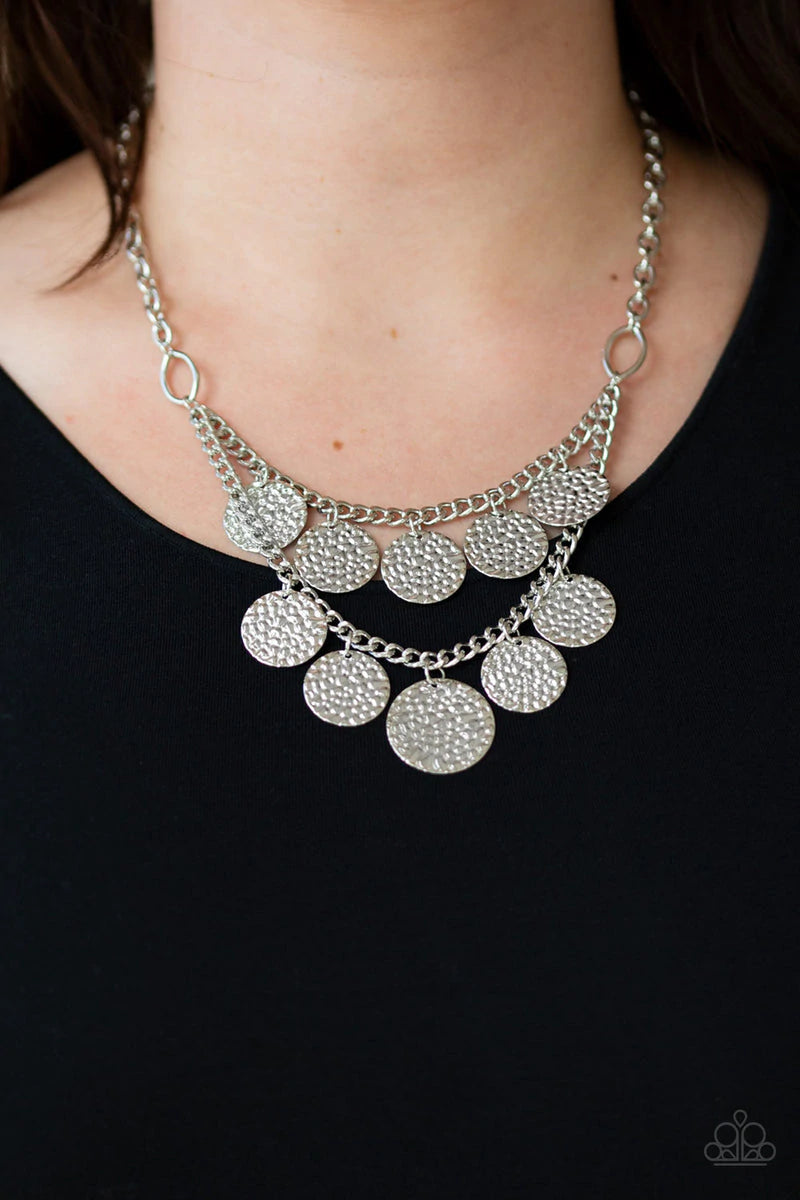 Paparazzi Accessories Chime Warp - Silver Rippling with glistening textures, glistening silver discs dance along two shimmery silver chains, creating an edgy fringe below the collar. Features an adjustable clasp closure. Sold as one individual necklace. I