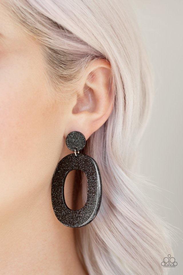 Paparazzi Accessories Miami Boulevard - Black Brushed in a glittery finish, a large black hoop swings from the bottom of a rounded fitting for a retro glamorous look. Earring attaches to a standard post fitting. Sold as one pair of post earrings. Jewelry